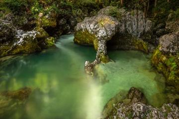 Free Discover the serene emerald pool in Slovenia's Mostnica Gorge. Tranquil and natural beauty. Stock Photo