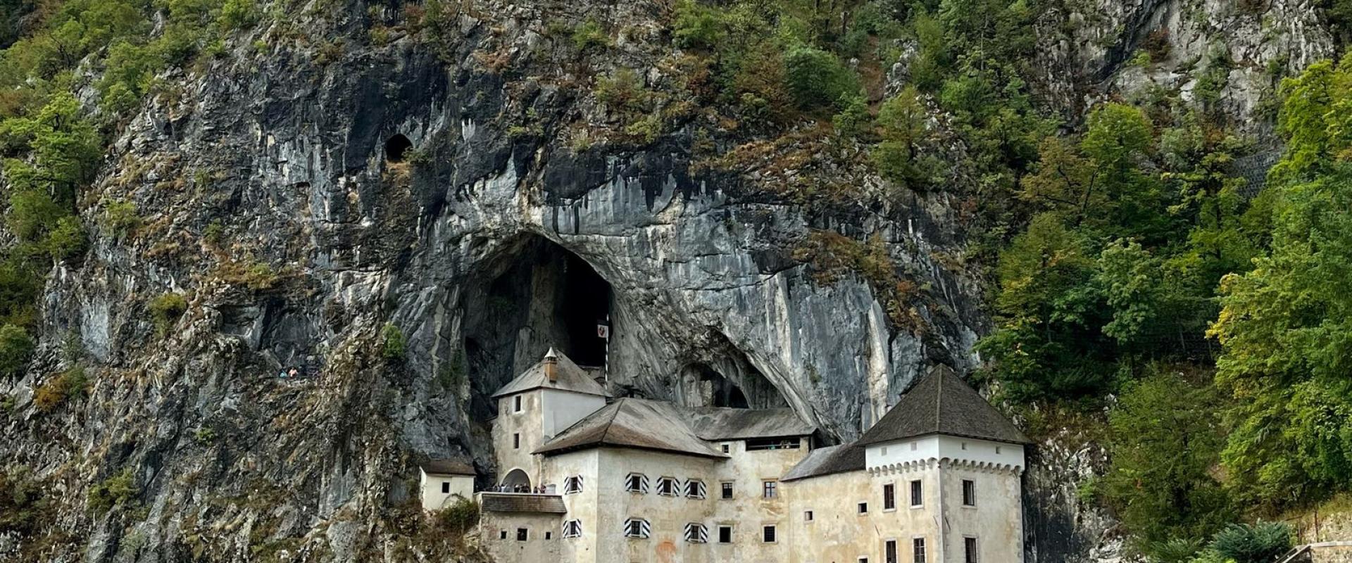 Free Explore the stunning Predjama Castle set in a cliff in Slovenia. Stock Photo